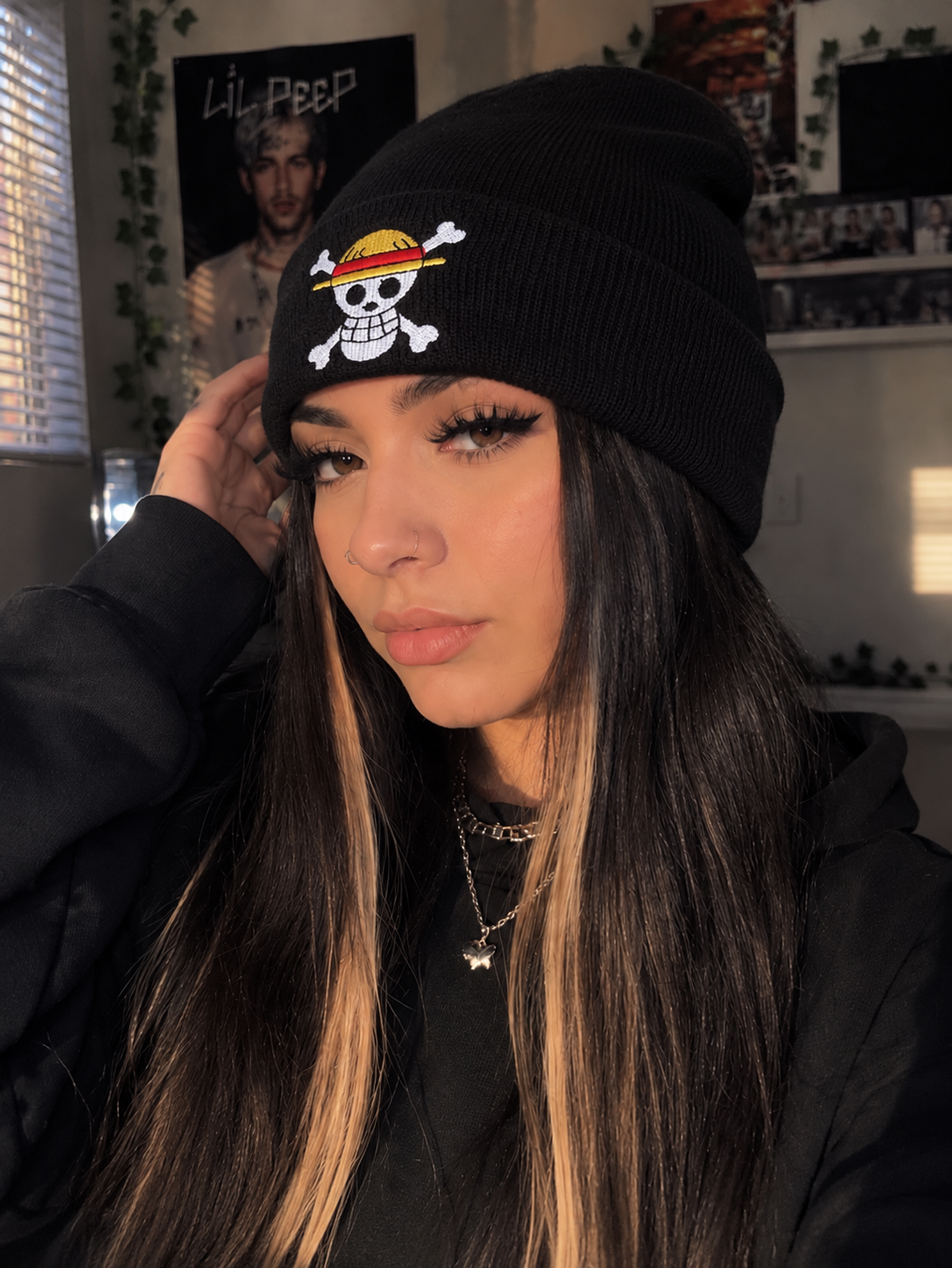 AI-generated lifestyle styling example of an embroidered pirate skull beanie